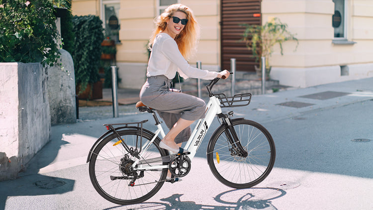 The woman riding the commute ebike on the street