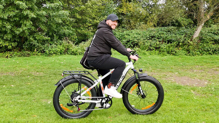 The man is enjoying riding the M26-2 plus