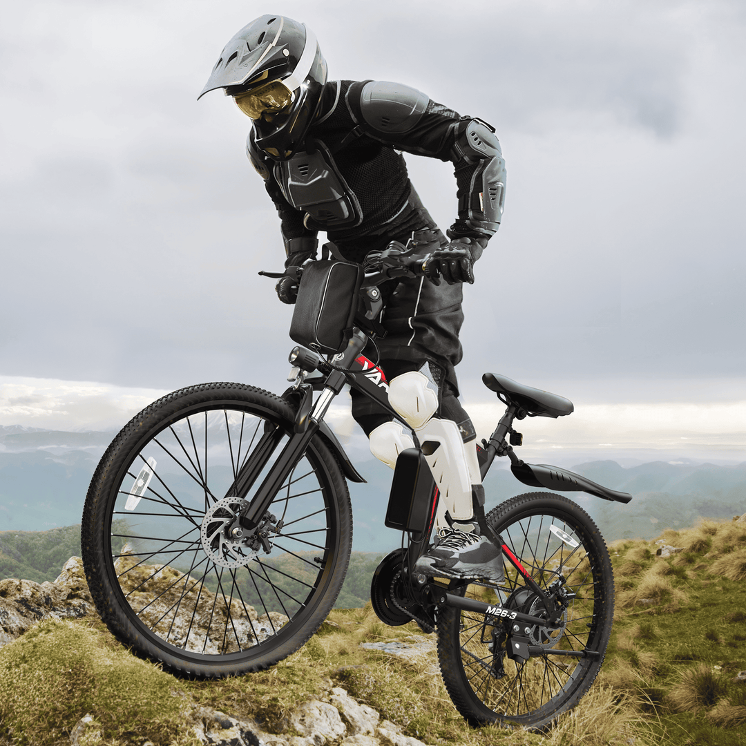 Female rider tackles a rocky mountain path on a foldable electric mountain bike, showcasing its off-road durability and lightweight design – perfect for rugged terrain and travel.  