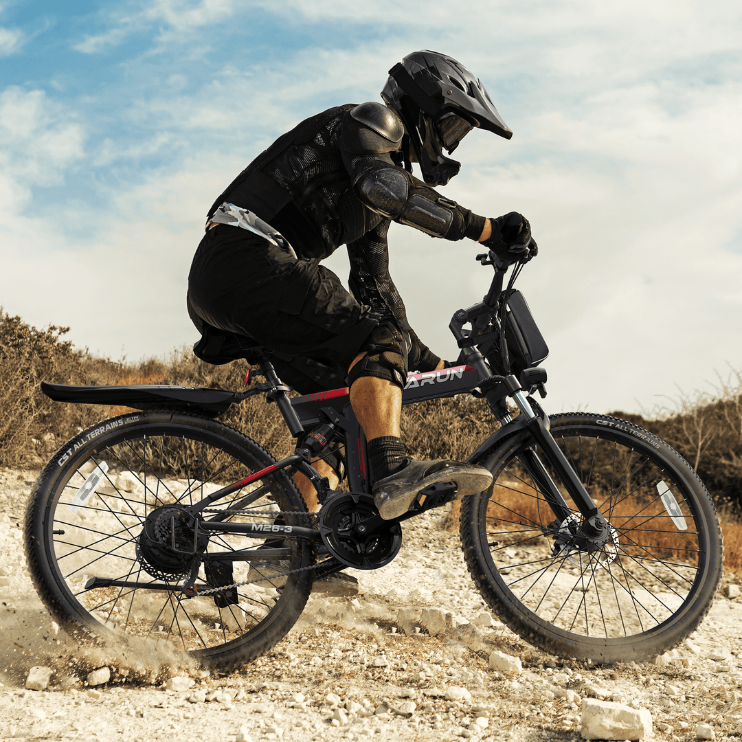 The man riding the ebike and conquring the steep road
